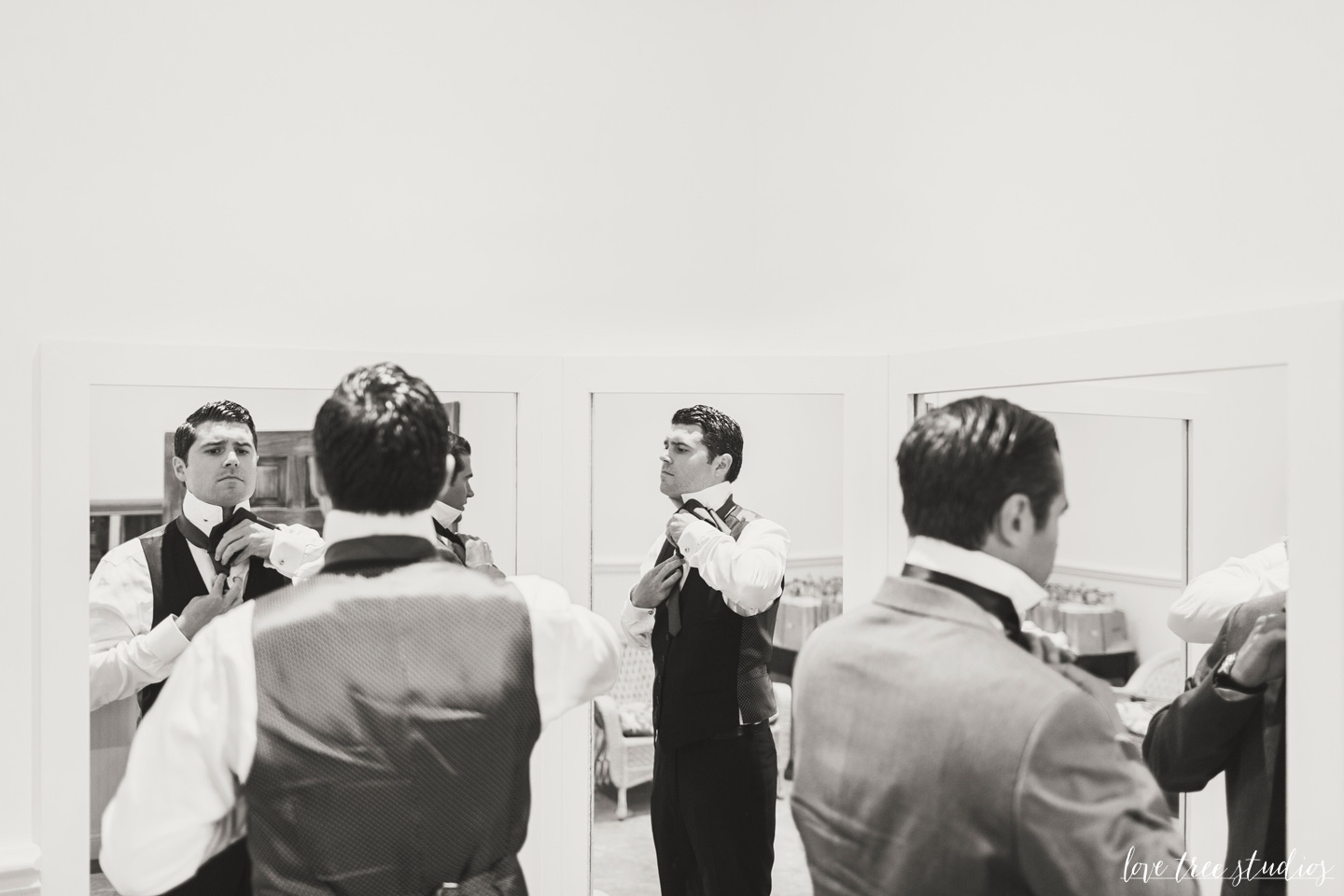 Groom dressing for wedding