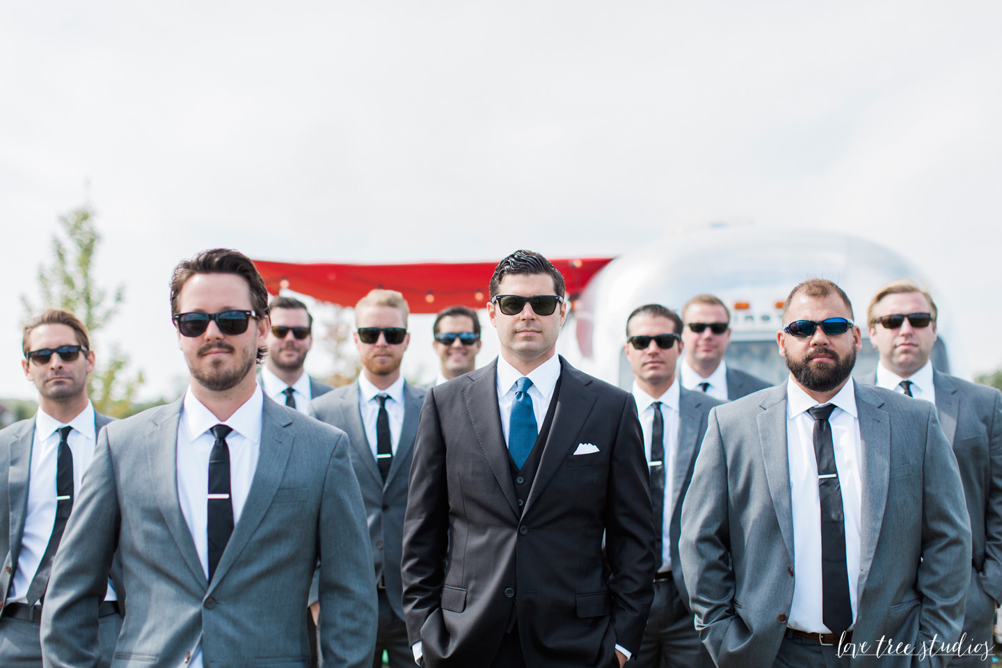 groom and his men in shades