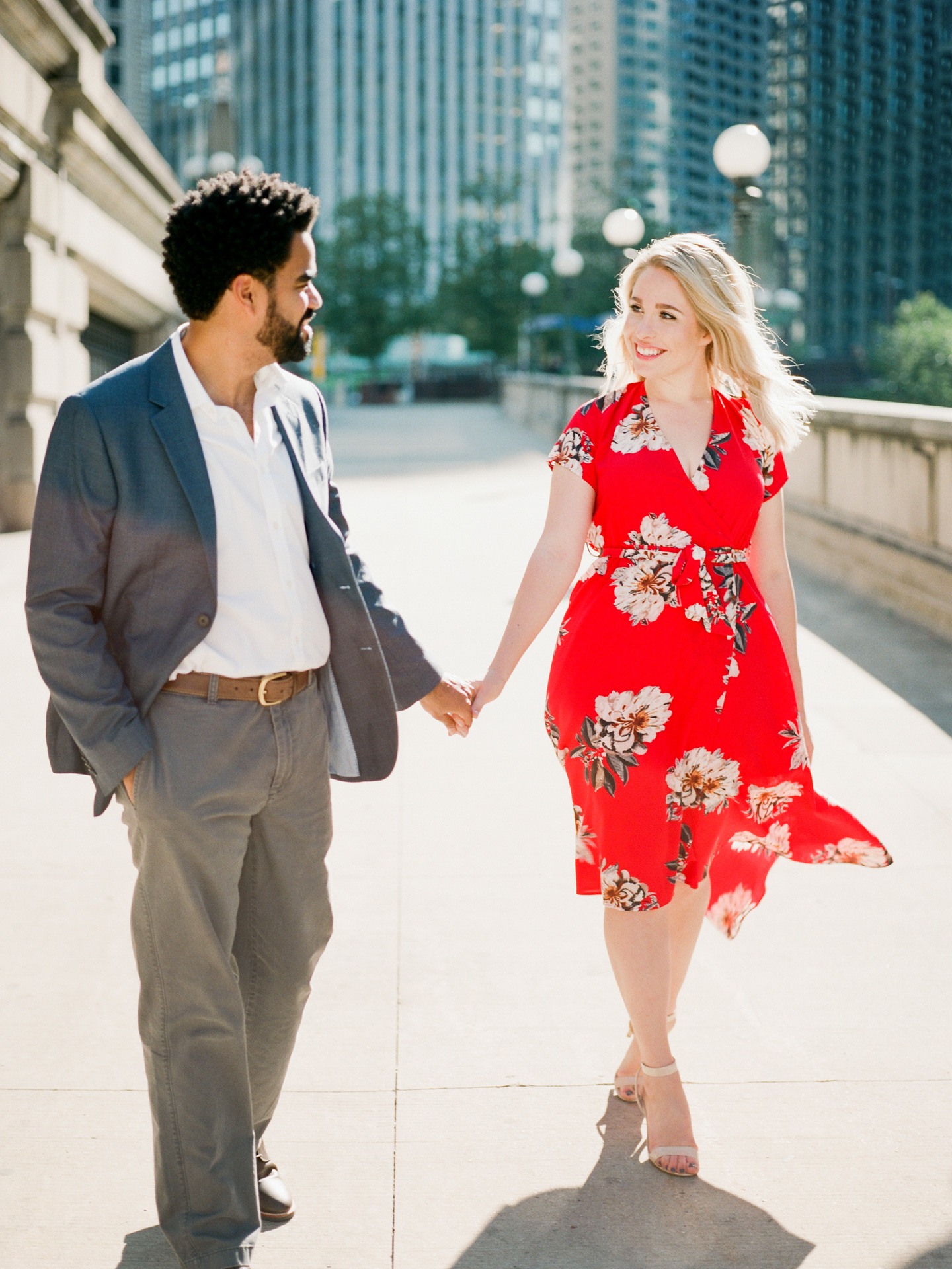 Chicago engagement session as couple strolls along the beautiful city