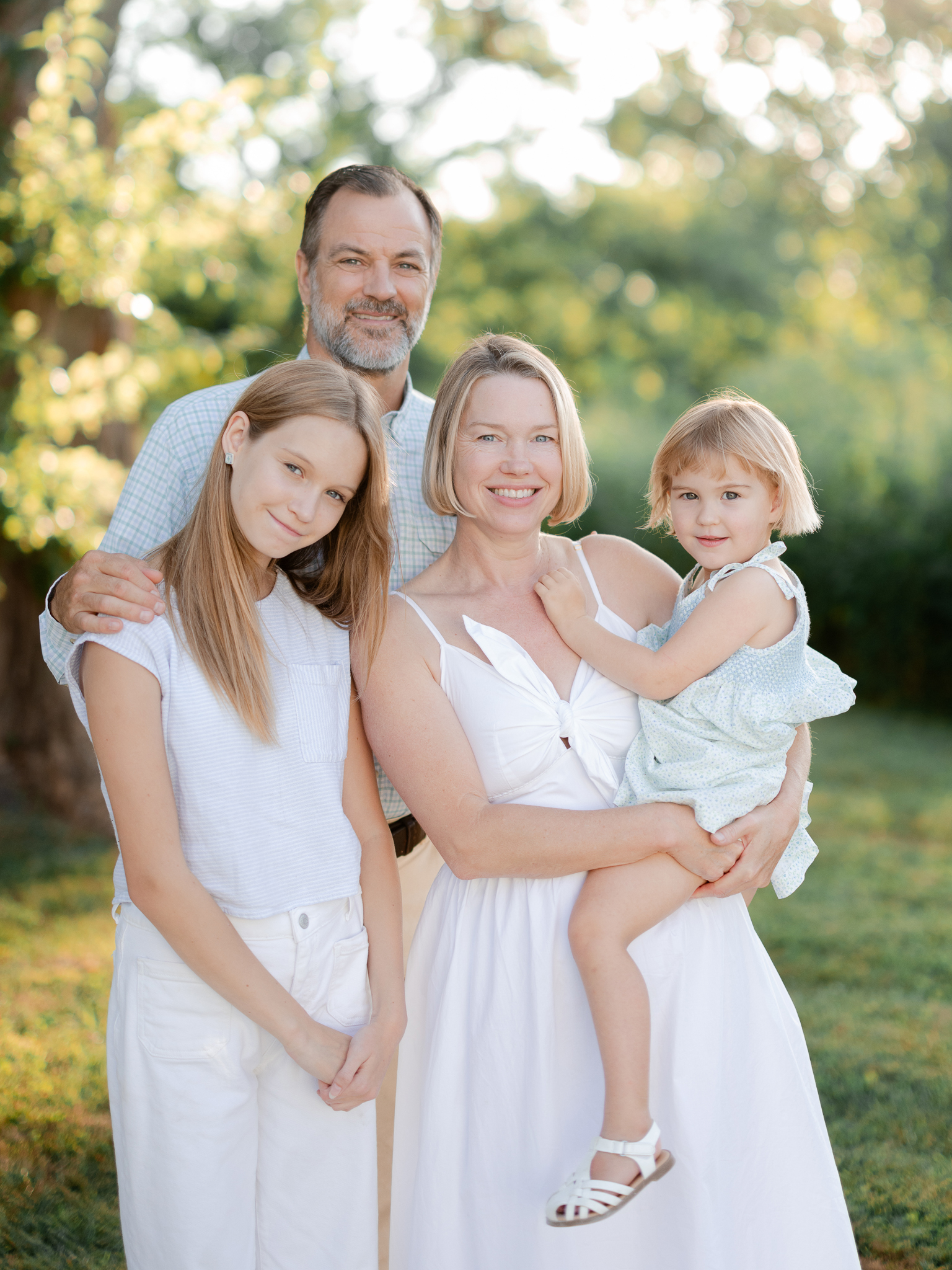 Bryant family portrait outdoors with golden light — captured by Love Tree Studios, Missouri family photographer.