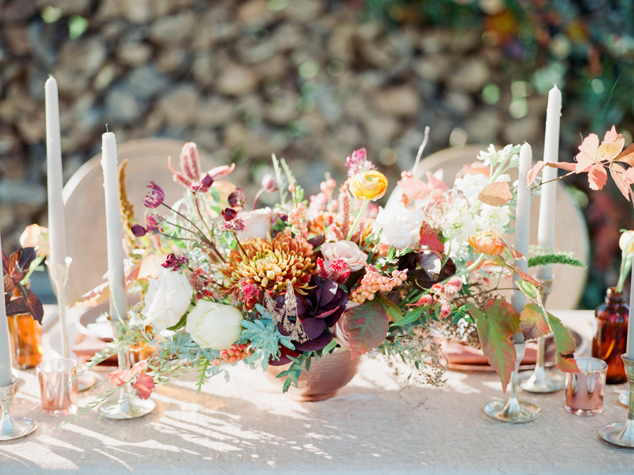 Fine art film wedding photographer Love Tree Studios captures a serene table setting of a wedding at Blue Bell Farm in Columbia, Missouri.