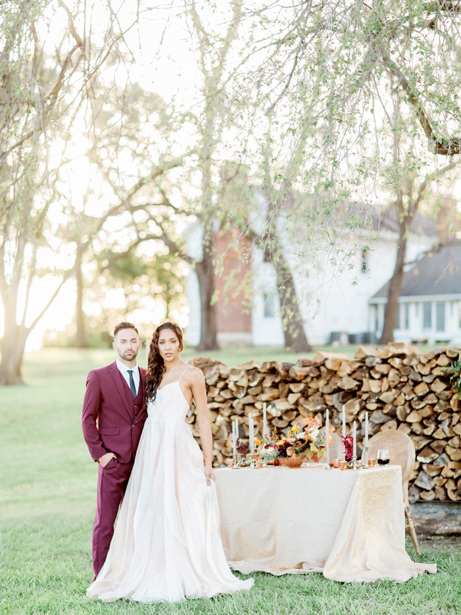 Fine art film wedding photographer Love Tree Studios captures a serene table setting of a wedding at Blue Bell Farm in Columbia, Missouri.