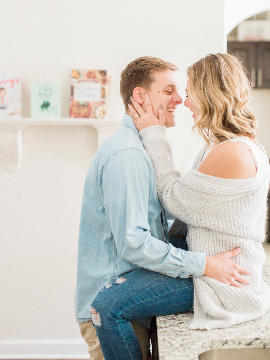 A beautiful and simple intimate in-home engagement portrait by Love Tree Studios.