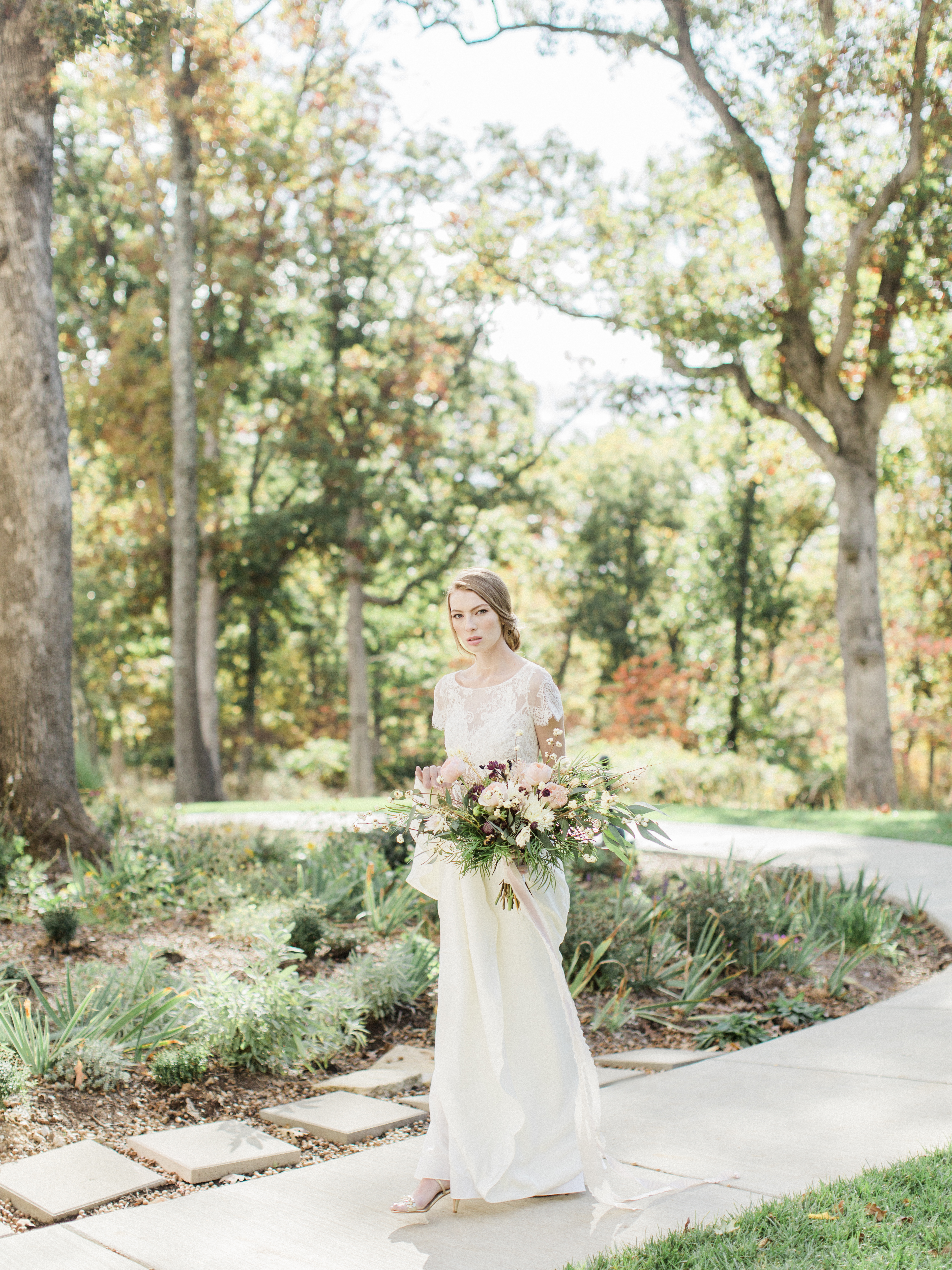 A beautiful bride captured on film by destination wedding photorapher Love Tree Studios at Silver Oaks Chateau in St. Louis Missouri.
