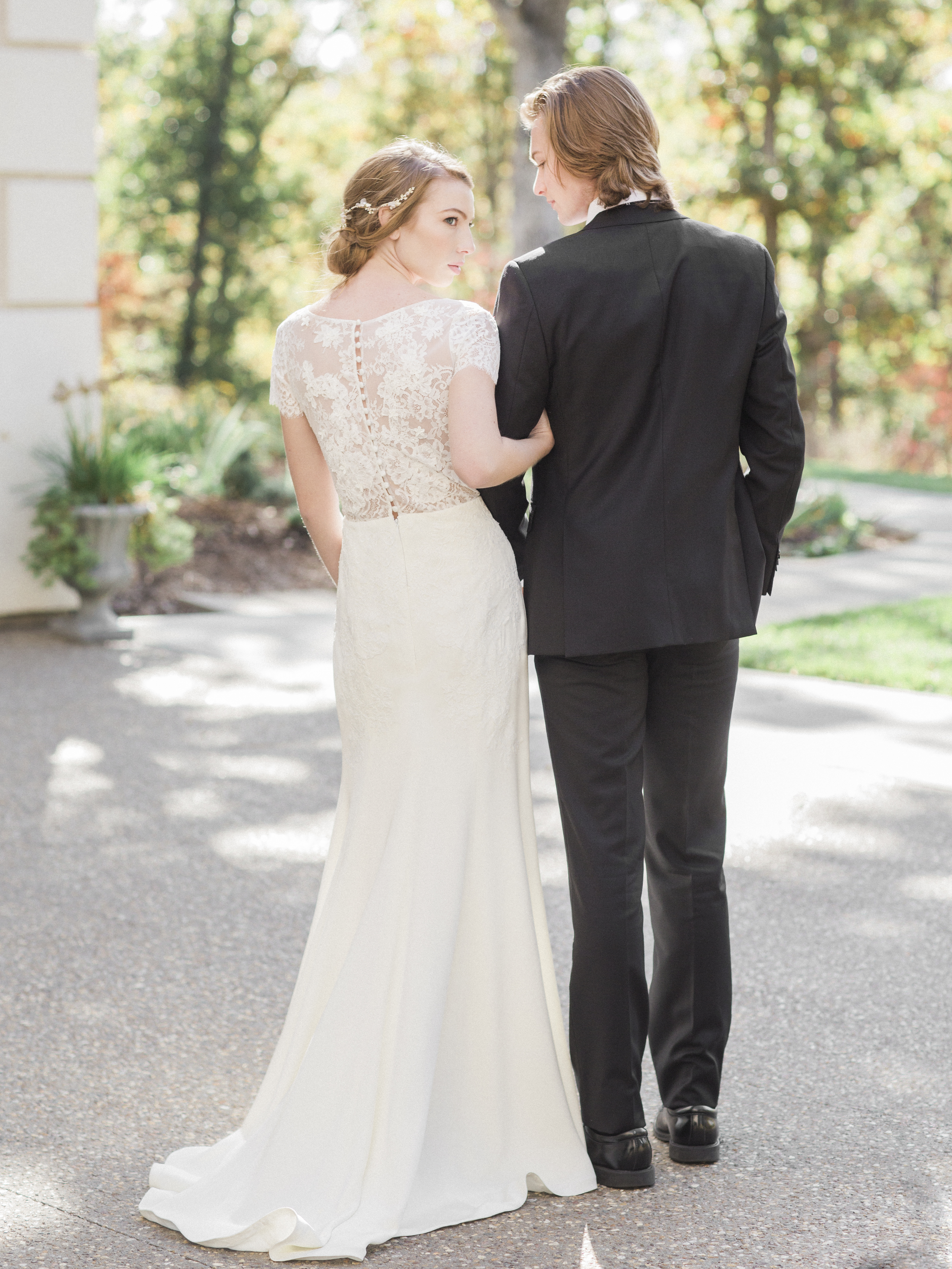 A moment between bride and groom captured by Missouri wedding photographer Love Tree Studios at Silver Oaks Chateau.