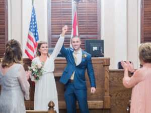 A couple weds in an intimate courthouse wedding ceremony at the Munical Courthouse in Columbia Missouri by photographer Love Tree Studios.