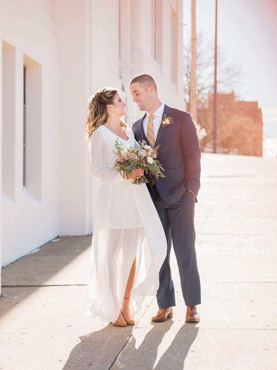 Wedding photographer Love Tree Studios captures and intimate courthouse wedding in Columbia, Missouri.