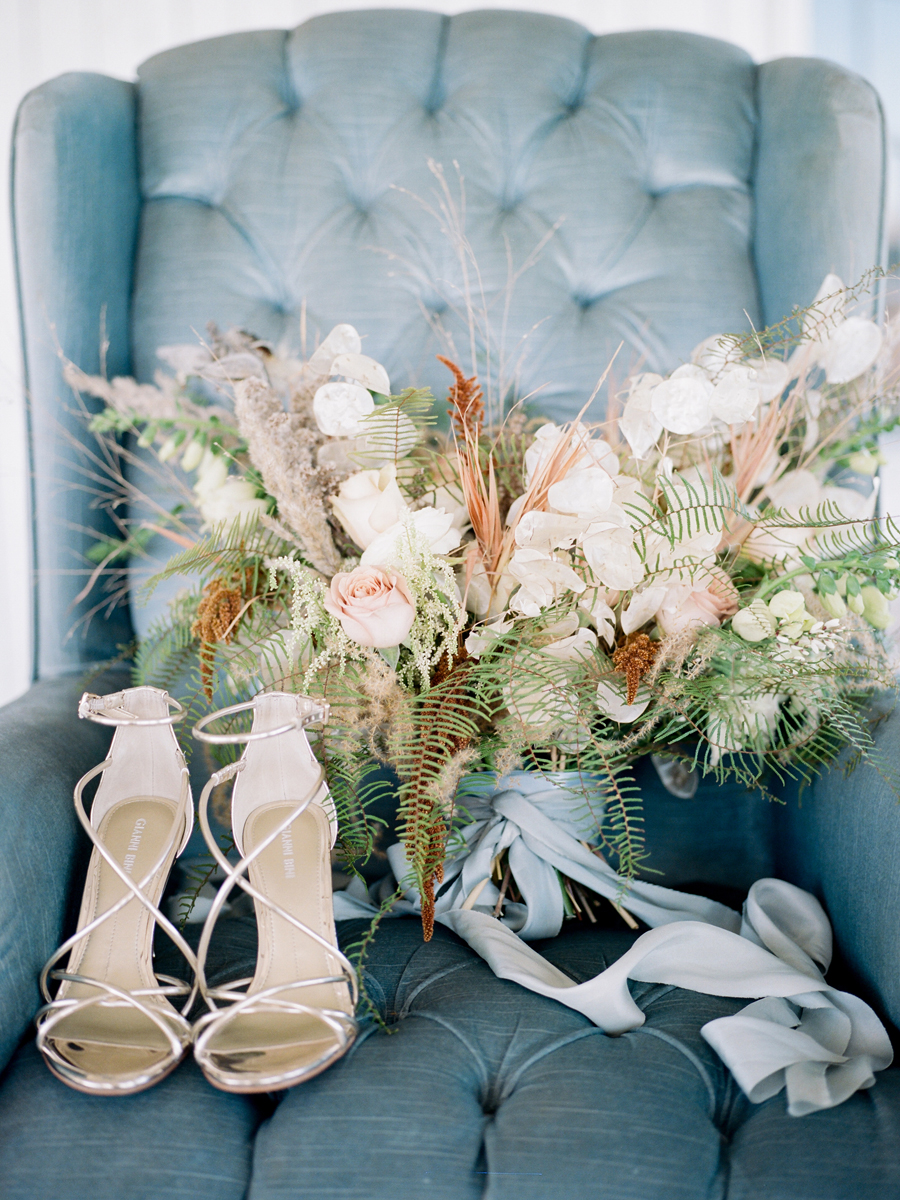 The bridal bouquet by Sugarberry Blooms at a Missouri wedding by photographer Love Tree Studios.