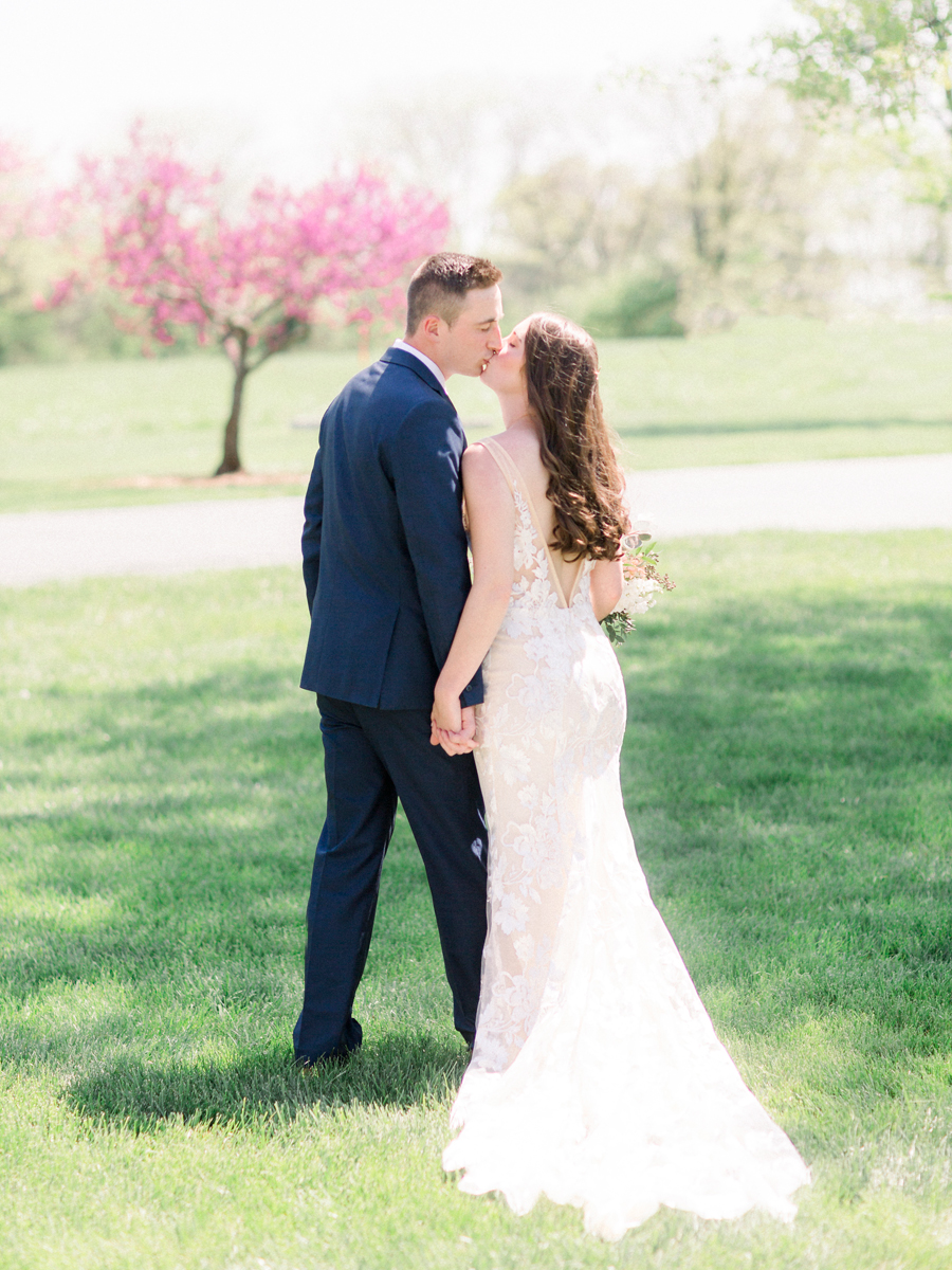 A bride and groom portrait during their Columbia Missouri wedding captured by wedding photographer Love Tree Studios.