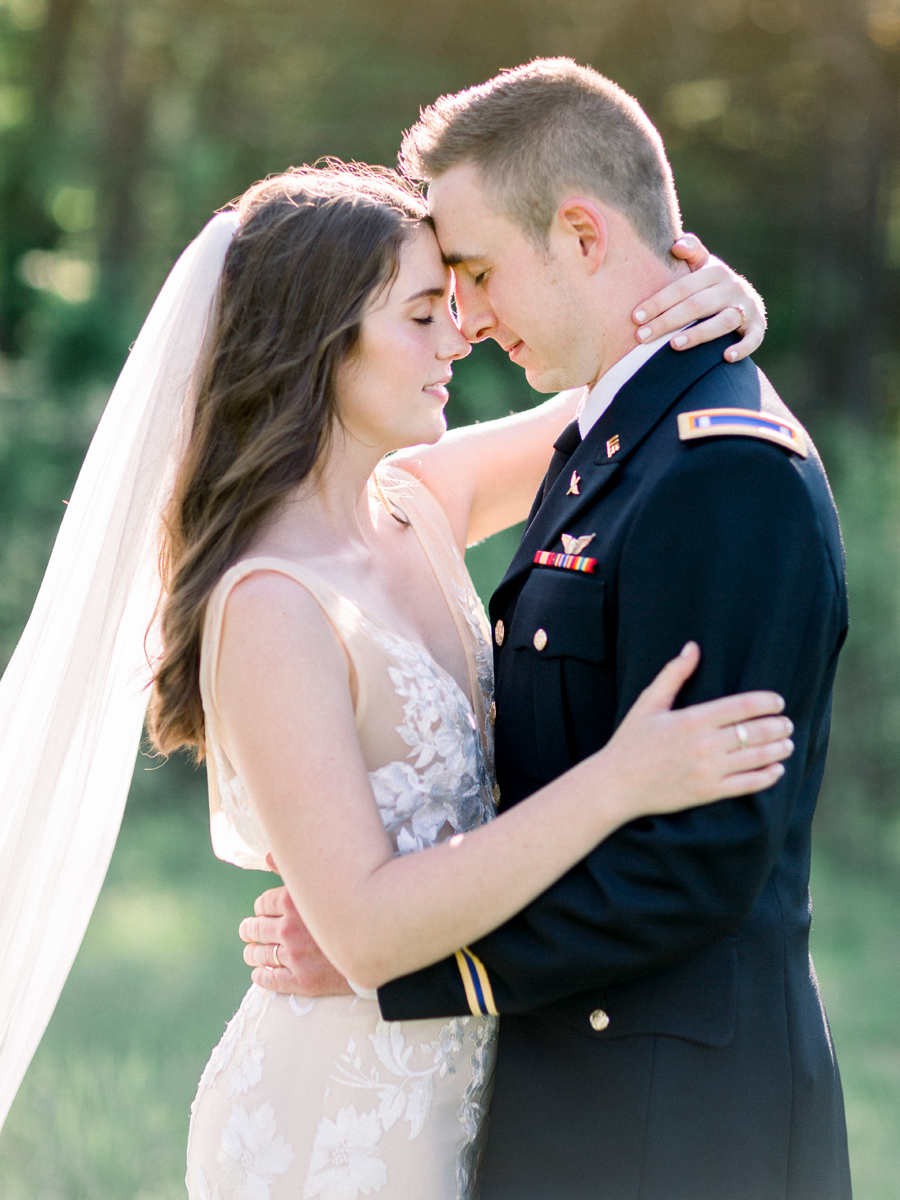 A bride and groom portrait during their Columbia Missouri wedding captured by wedding photographer Love Tree Studios.
