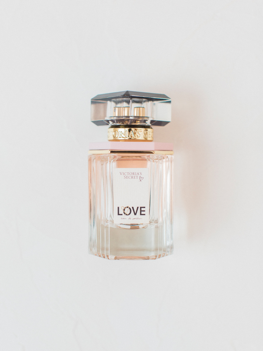 Victoria's Secret Love perfume styled and photographed by Love Tree Studios at a camdenton missouri wedding.
