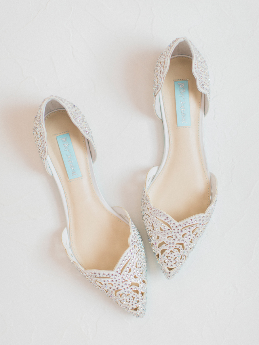 Wedding shoes by Betsy Johnson styled and photographed by Love Tree Studios at a camdenton missouri wedding.