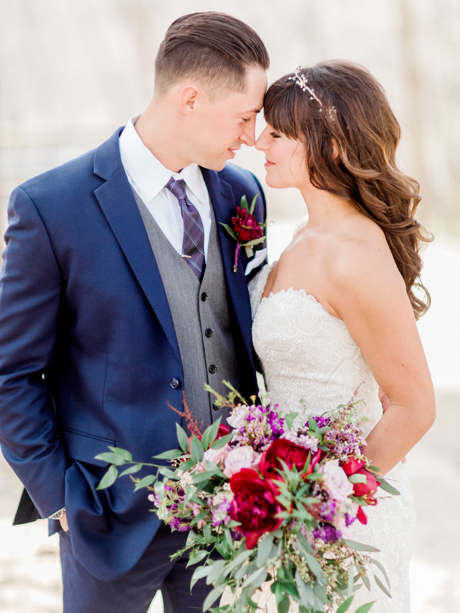 The bride and groom portrait by fine art wedding photographer Love Tree Studios for a Camdenton Missouri wedding.