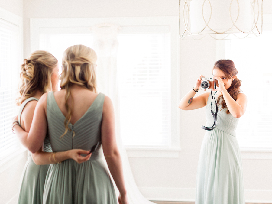 Love Tree Studios photographs the bride as she prepares for her Jefferson City Missouri wedding.