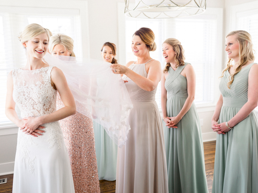 Love Tree Studios photographs the bride as she prepares for her Jefferson City Missouri wedding.