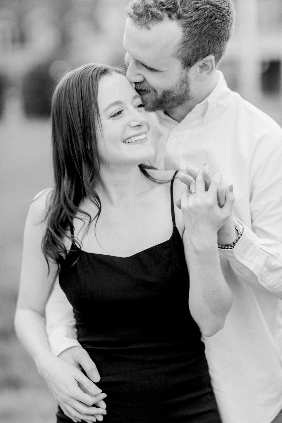 A couple dances during their outdoor engagement session in Columbia, MO.