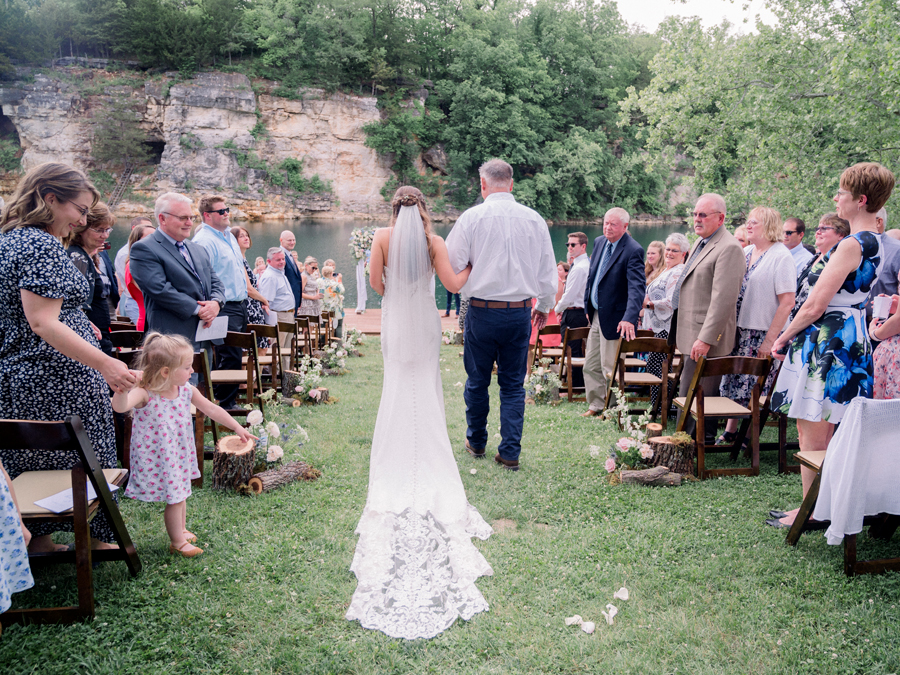 A bride walks down the aisle for her wedding at Wildcliff Weddings and Events.