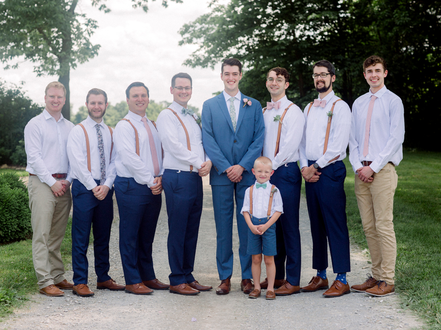 The groomsmen and the ring bearer at a Blue Bell Farm wedding by Love Tree Studios.