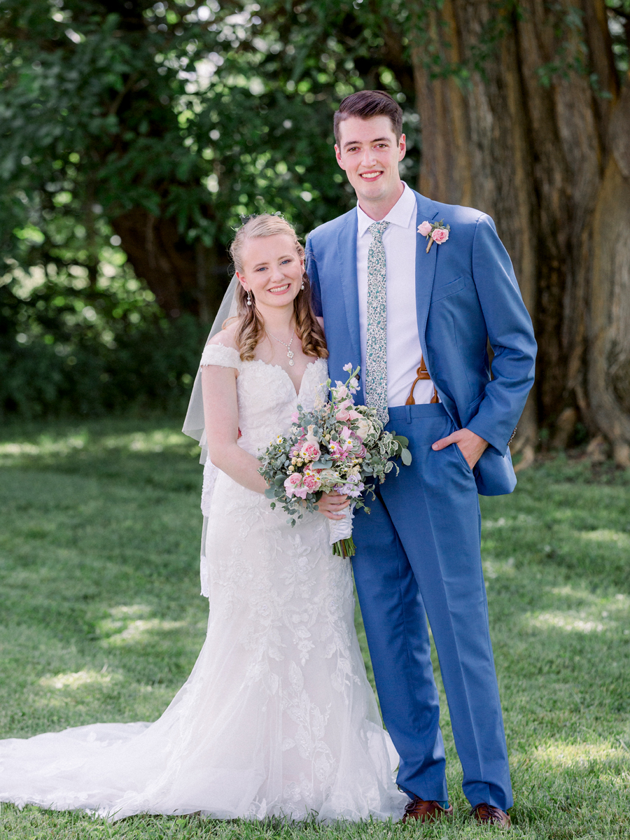 A portrait of the bride and groom at a Blue Bell Farm wedding by Love Tree Studios.