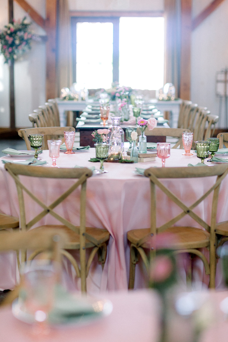 A photo of the guest tables at a reception at a Blue Bell Farm wedding by Love Tree Studios.