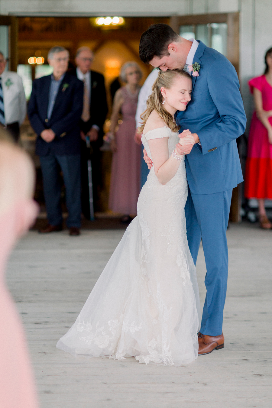 The bride and groom have their first dance at a Blue Bell Farm wedding by Love Tree Studios.