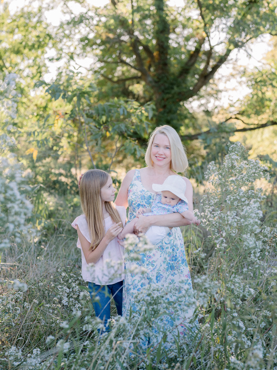 Three generations of daughters pose together for their Fayette Missouri family photography session by Love Tree Studios.