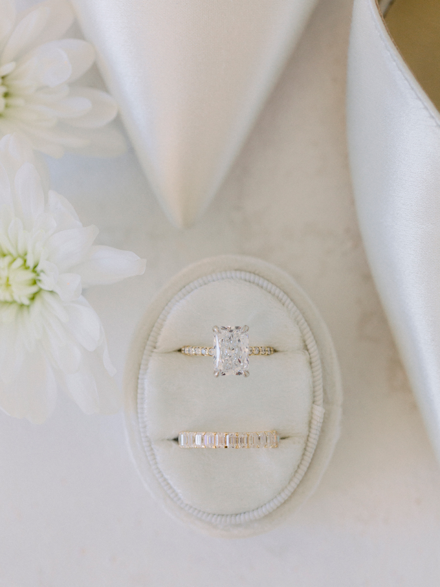 The couple's wedding rings in a ring box ready for their elegant Stephens College wedding photographed by Columbia, Missouri wedding photographer Love Tree Studios.