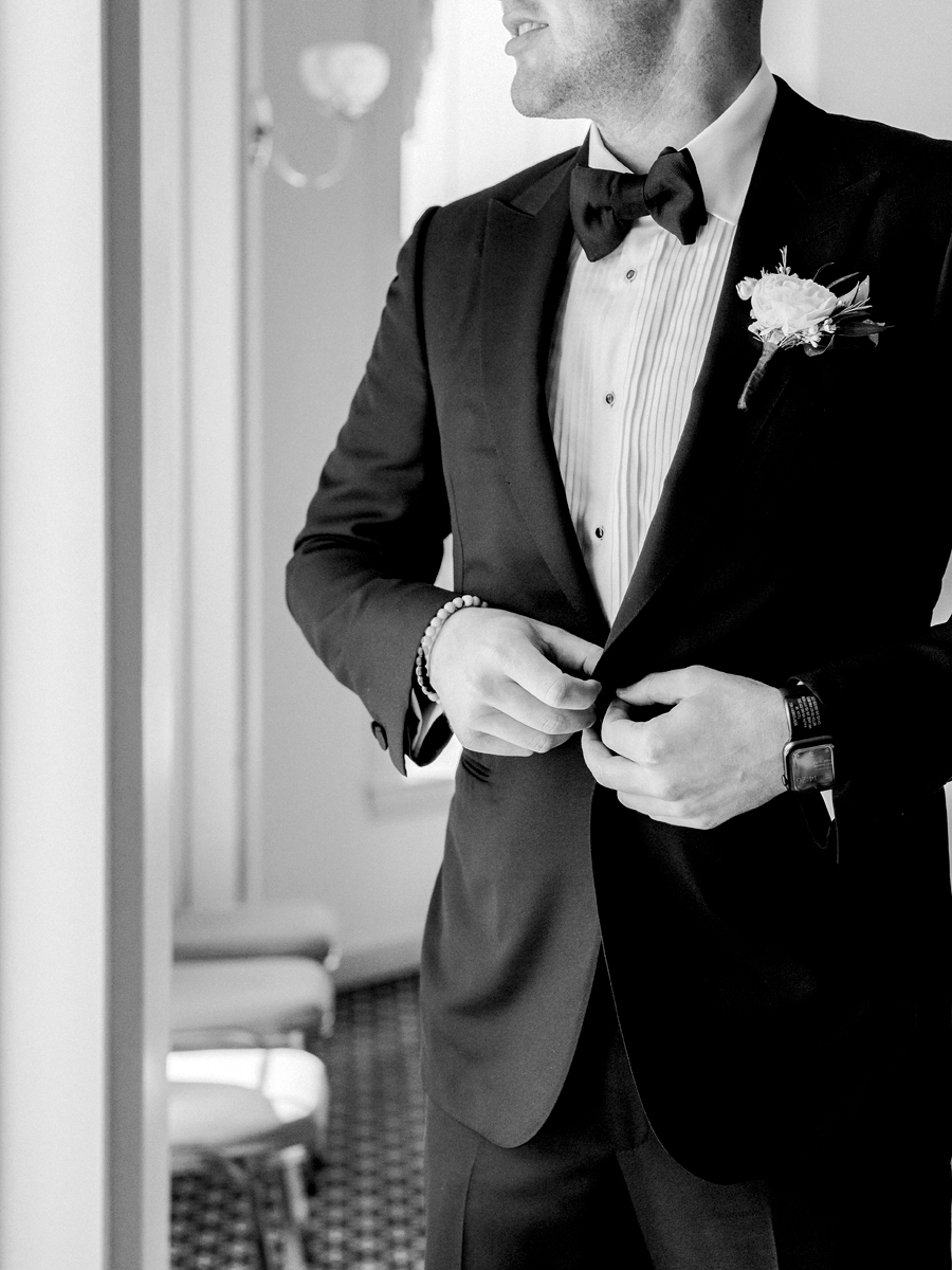 The groom getting ready for his Stephens College wedding photographed by Kansas City, Missouri wedding photographer Love Tree Studios.