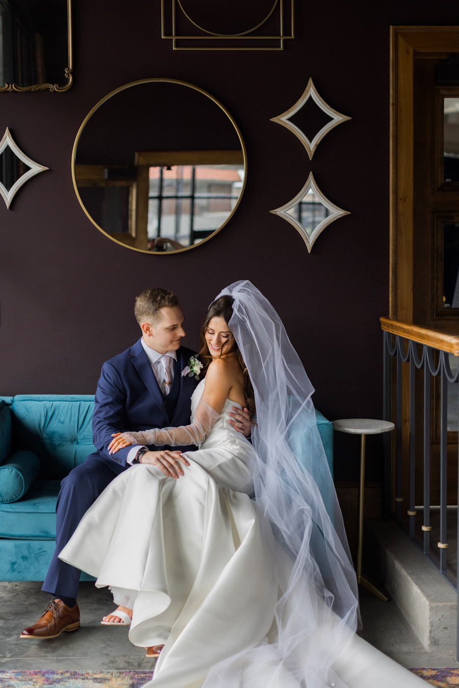 The bride and groom take portraits for their The Atrium on Tenth wedding in Columbia, Missouri by Love Tree Studios.