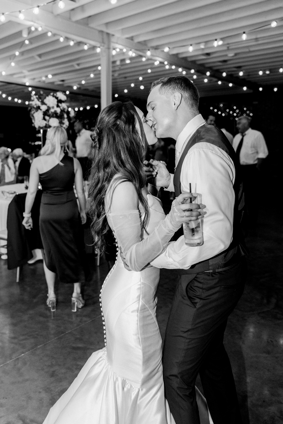 The bride and groom dance during their reception of their The Atrium on Tenth wedding in Columbia, Missouri by Love Tree Studios.