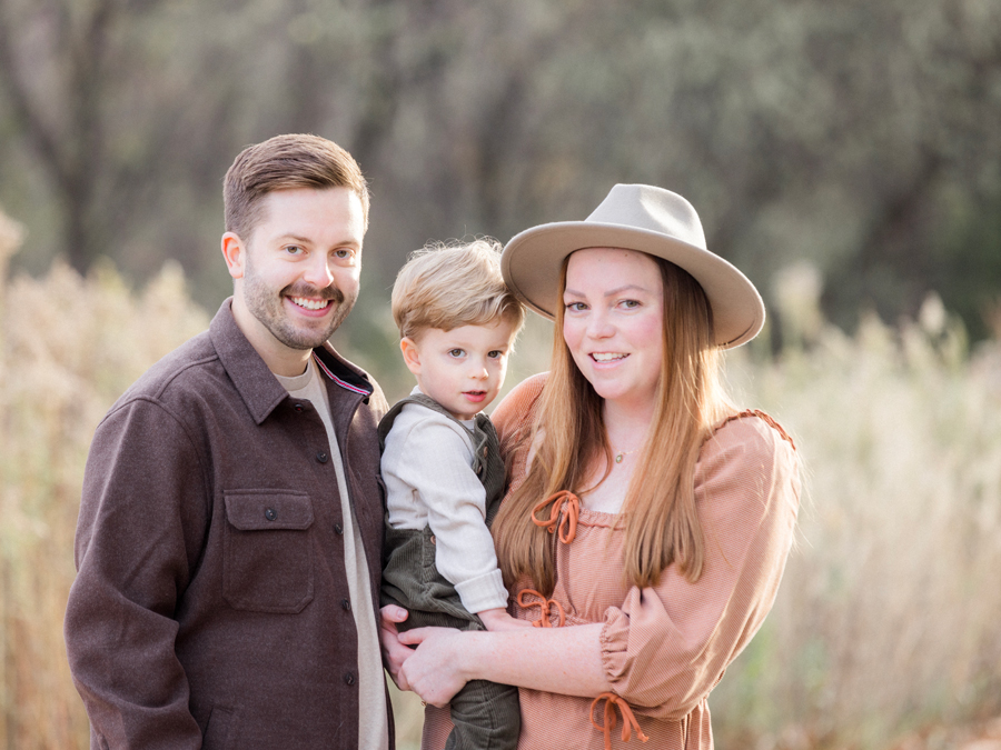 A family takes outdoor family portrait in fall by Columbia, Missouri family photographer Love Tree Studios.
