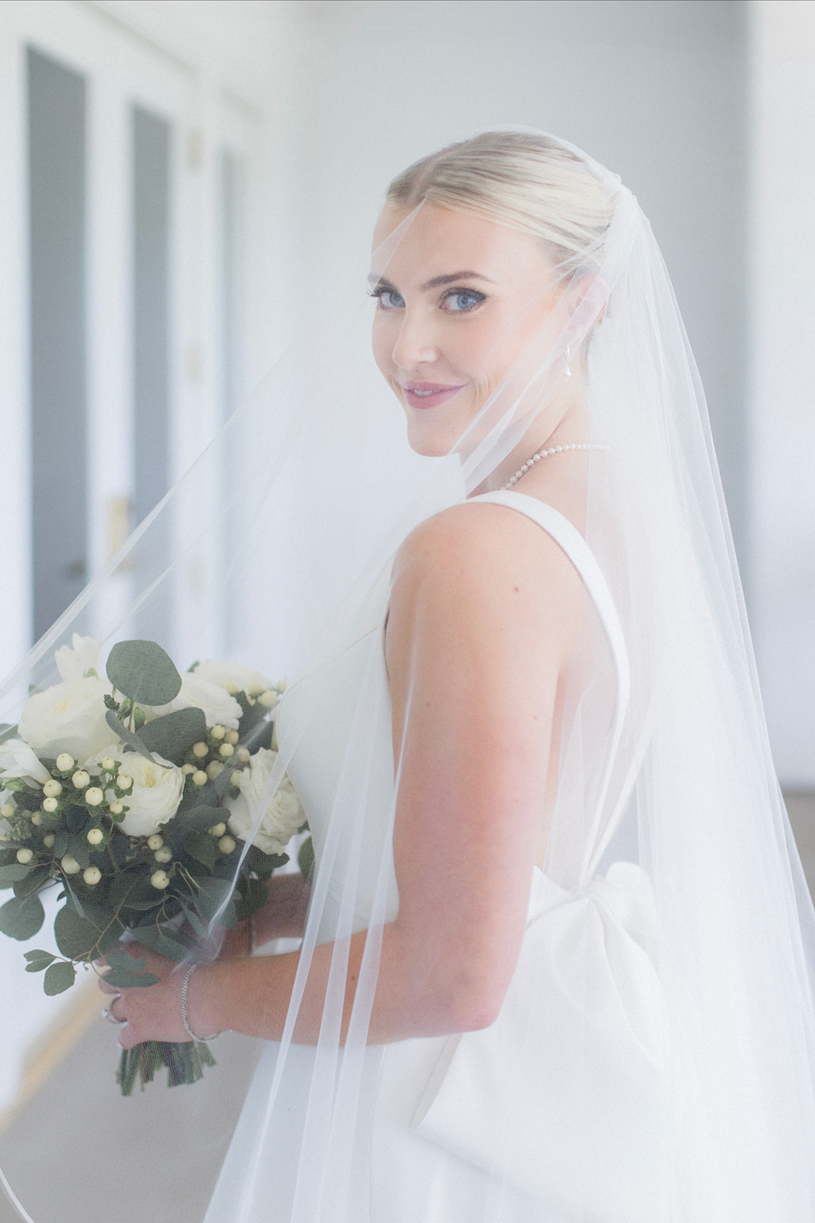 Bridal portraits at the Club at Old Hawthorne for a Westminster College wedding by Love Tree Studios.
