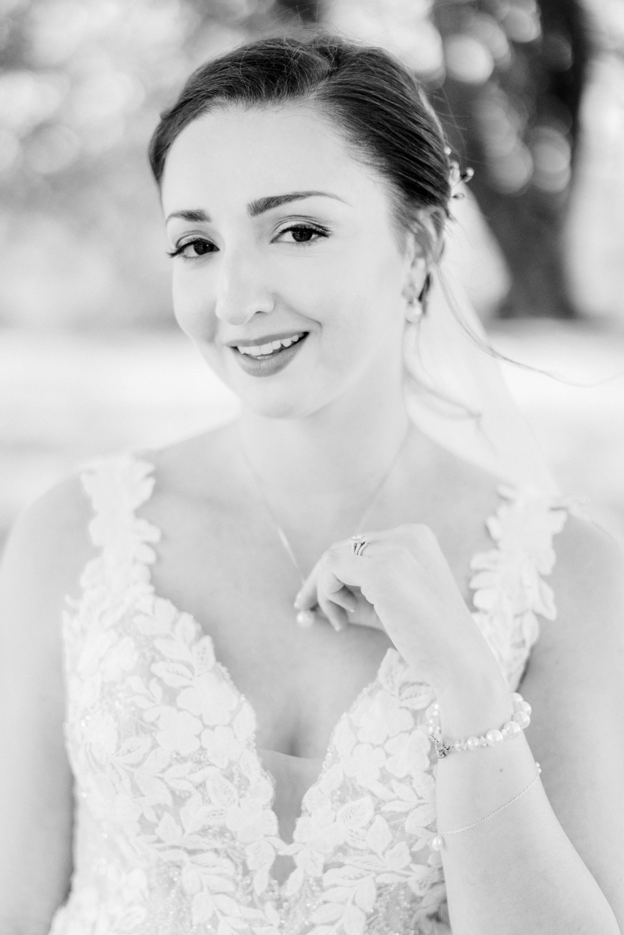 A bride poses for portraits at her Blue Bell Farm wedding by Missouri wedding photographer Love Tree Studios.