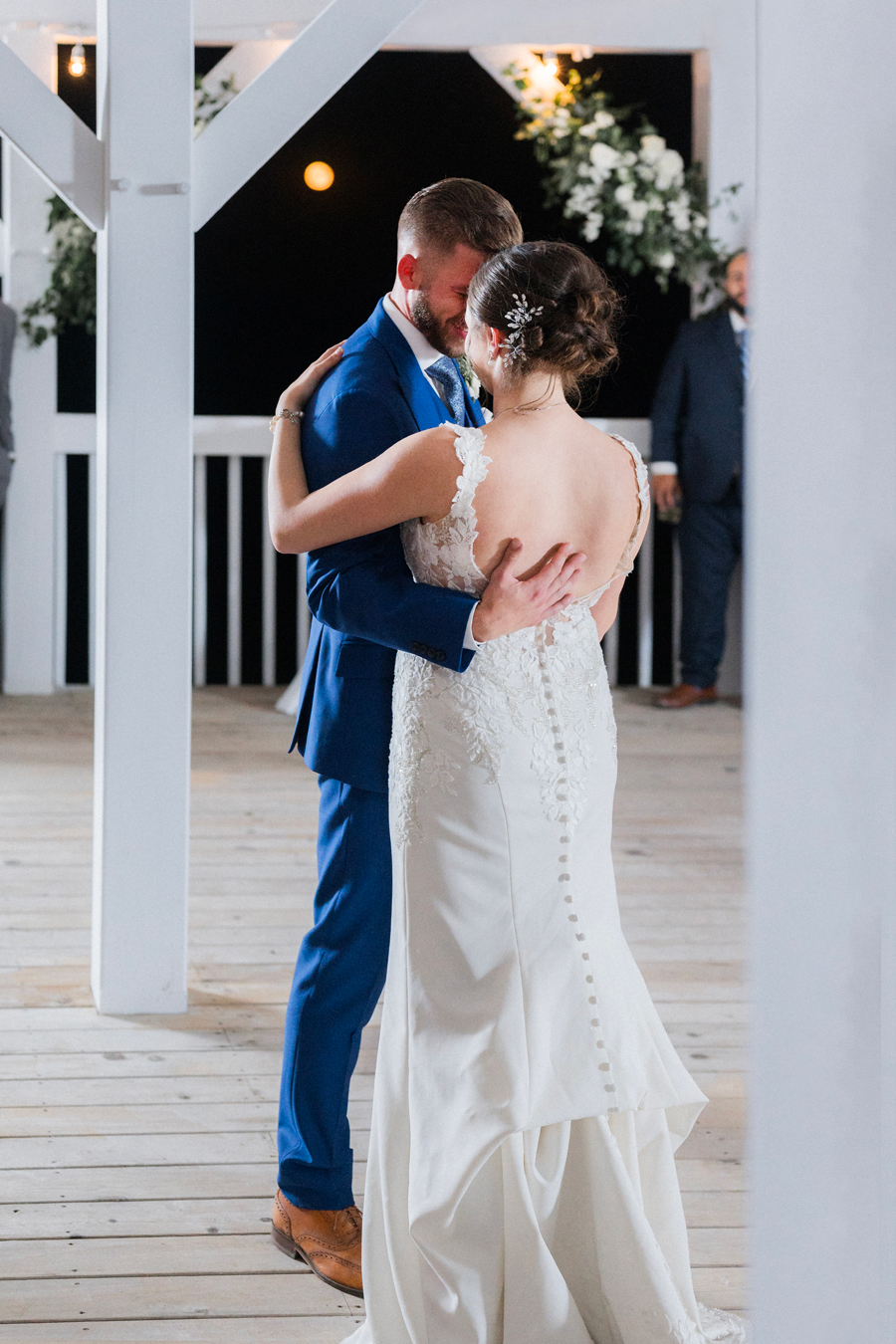 The bride and groom share a first dance at their Blue Bell Farm wedding by Missouri wedding photographer Love Tree Studios.