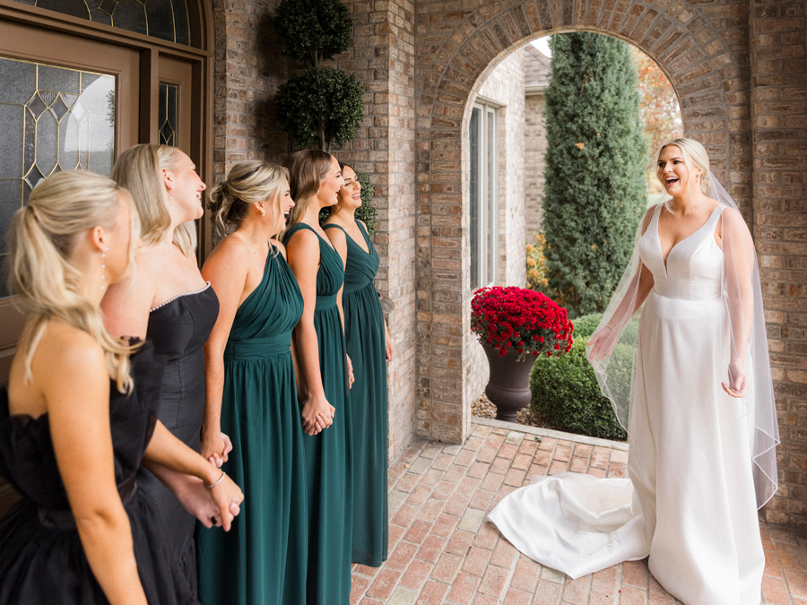 The bride and her mother dress for her Jefferson City wedding by Columbia, MO photographer Love Tree Studios.