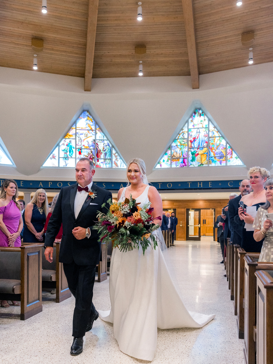 Love Tree Studios photographs a beautiful wedding in St. James Cathedral during a Jefferson City, Missouri wedding.