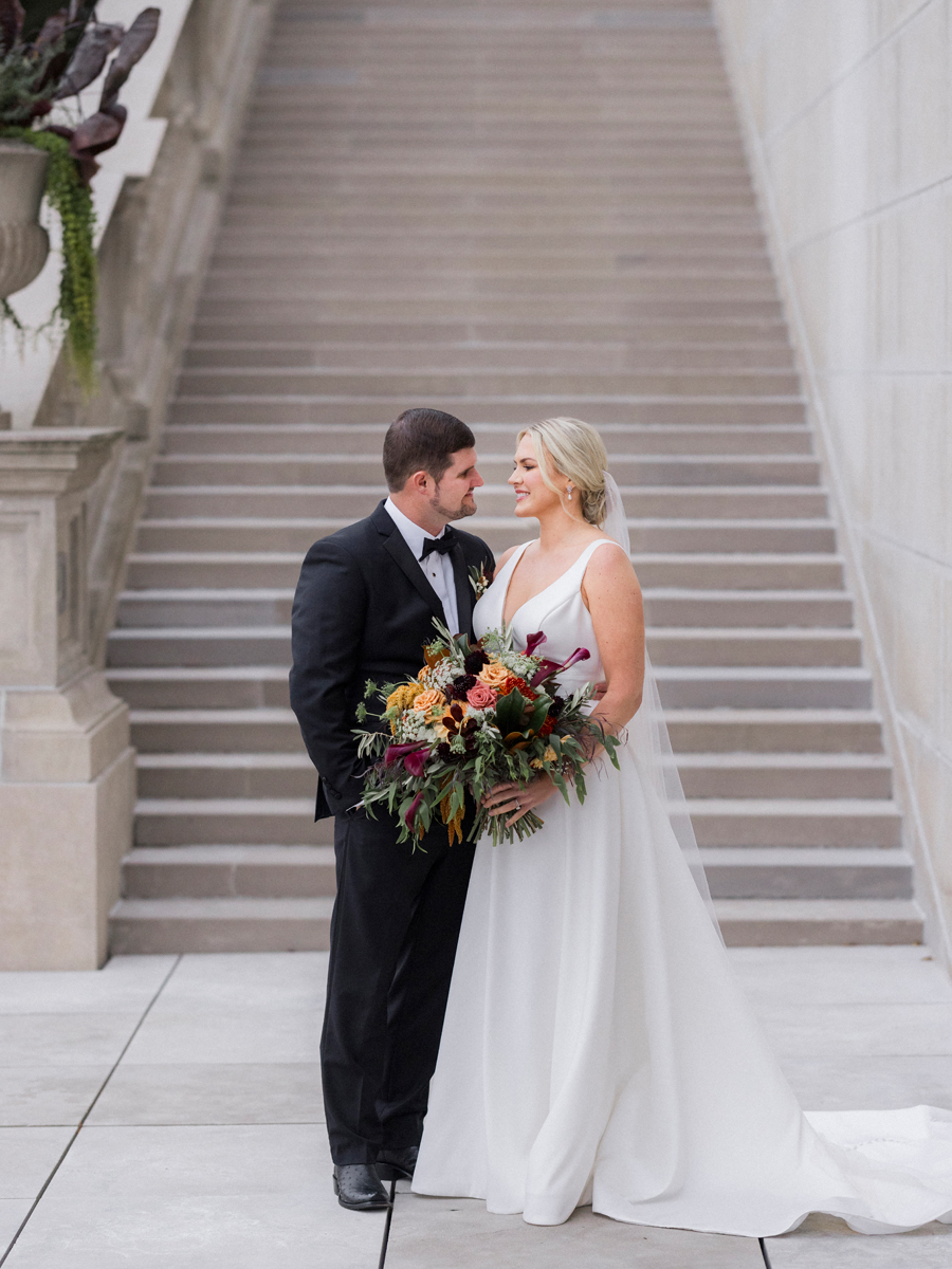 Love Tree Studios photographs a happy couple at the Missouri state Capitol during their Jefferson City, Missouri wedding.