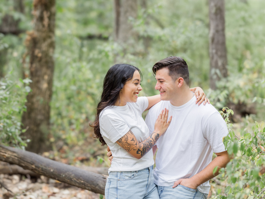 Bryanna and Chase smiling at each other in their Missouri engagement session.