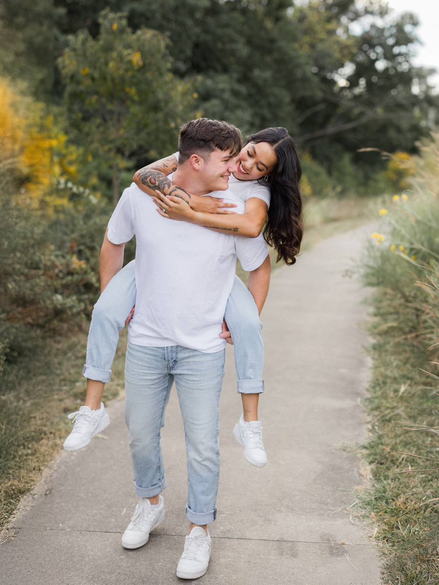 Bryanna and Chase sharing a playful moment during their engagement session in Missouri.