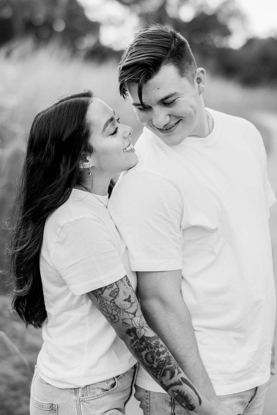 Bryanna and Chase looking at each other during their engagement session.