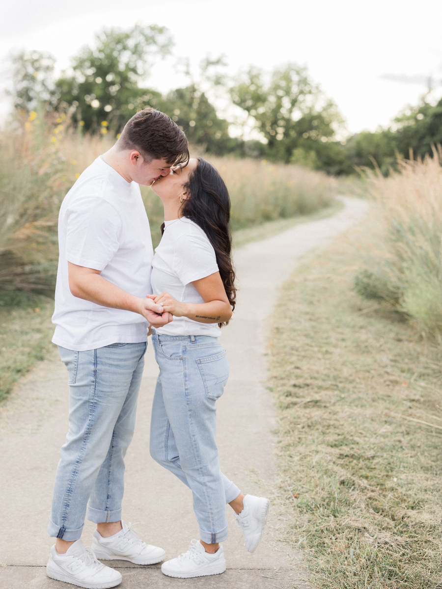 Couple embracing during their Missouri engagement session.