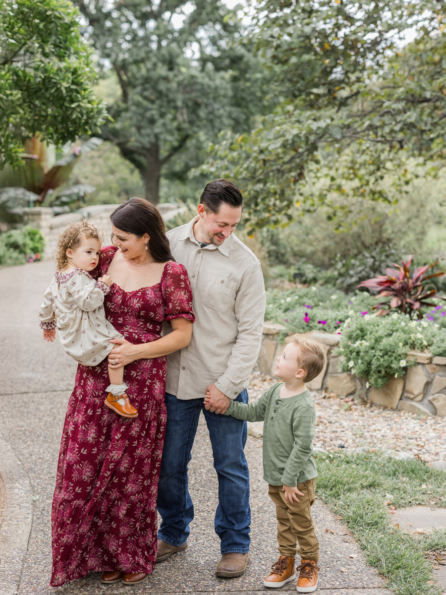 he entire family bursting into laughter, capturing a joyful moment together.