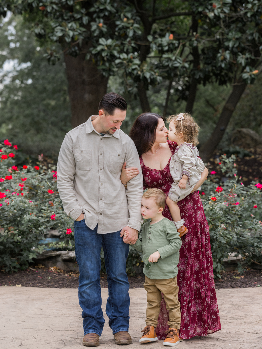 The Bahner family sharing a warm group hug during their session.