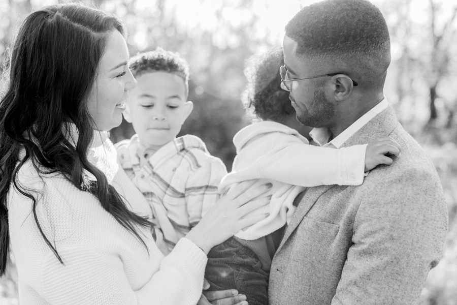 The Washington family playing together during their Pierpont Farms Family Session, captured by Love Tree Studios.