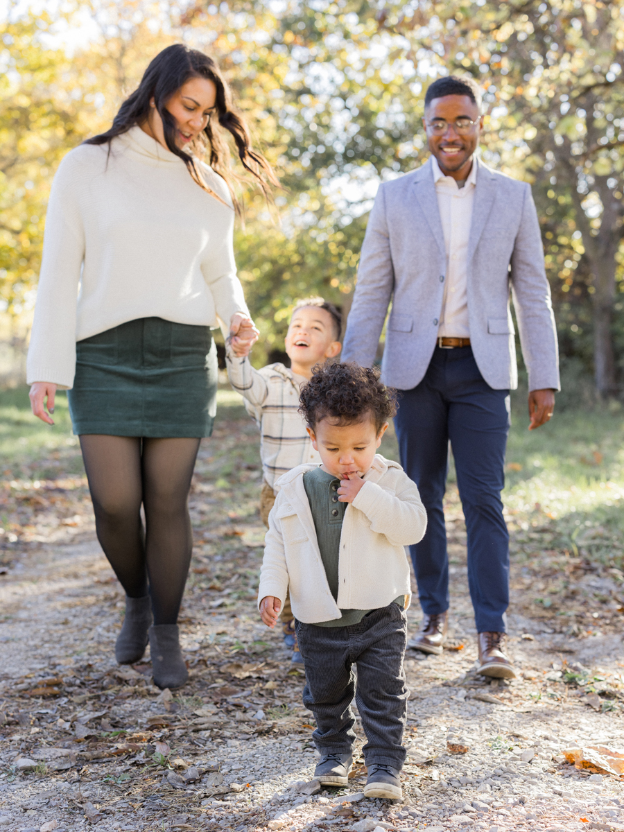 Theo exploring the gravel path during Pierpont Farms Family Session, photographed by Love Tree Studios.