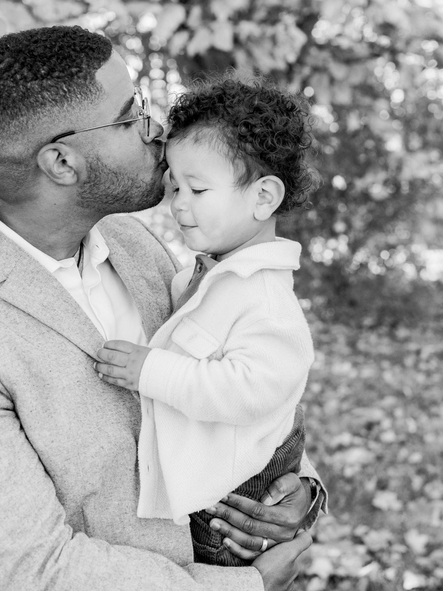 Close-up of Dad hugging Theo during their Pierpont Farms Family Session, photographed by Love Tree Studios.