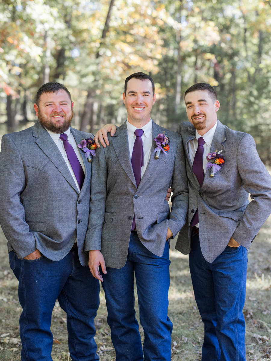 Groomsmen and groom in boots and blazers for a chic Western Missouri wedding, photographed by Love Tree Studios.