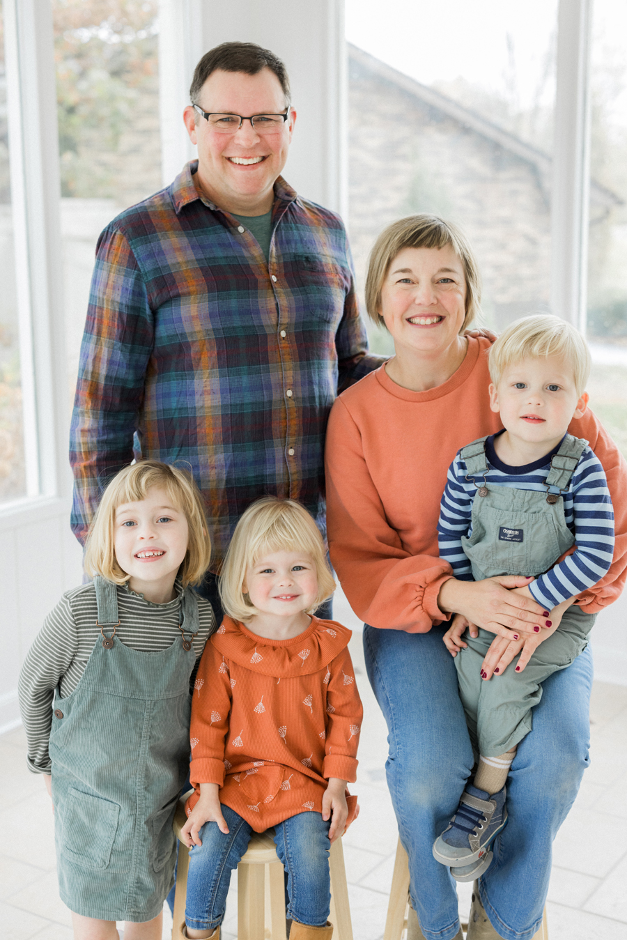 Vibrant studio family portrait fun in the Garden Studio at Love Tree Studios.