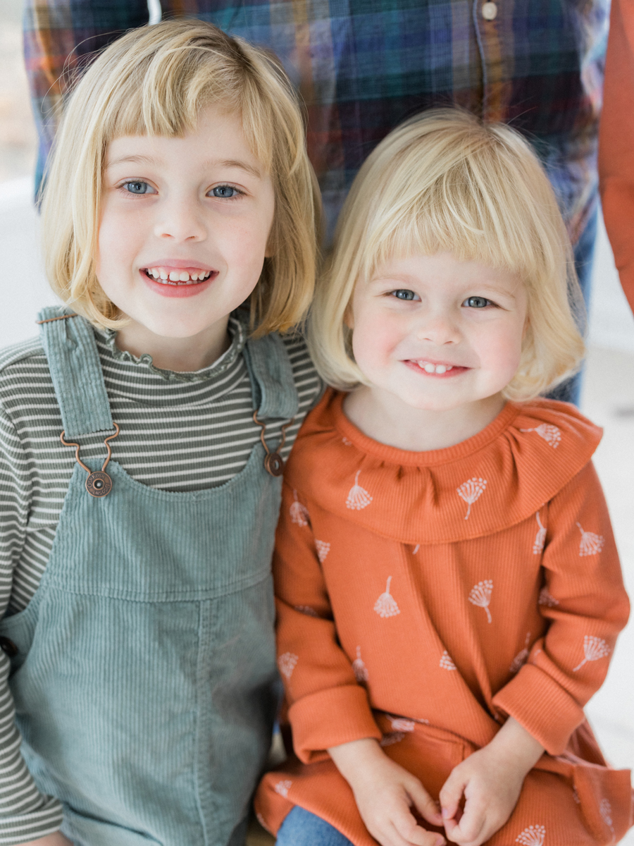 Family enjoying studio family portrait fun at Love Tree Studios.