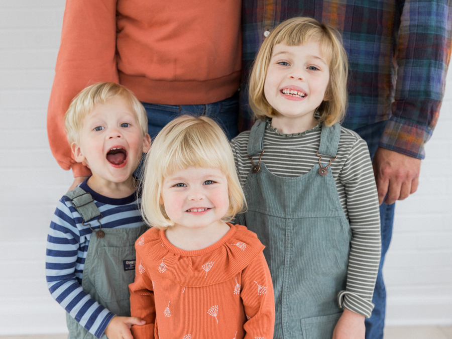 Studio family portrait fun moments at Love Tree Studios Garden Studio.